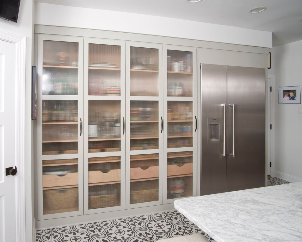 Inspiration for a mid-sized transitional u-shaped ceramic tile and multicolored floor eat-in kitchen remodel with a farmhouse sink, marble countertops, white backsplash, subway tile backsplash, stainless steel appliances, an island, gray cabinets and shaker cabinets