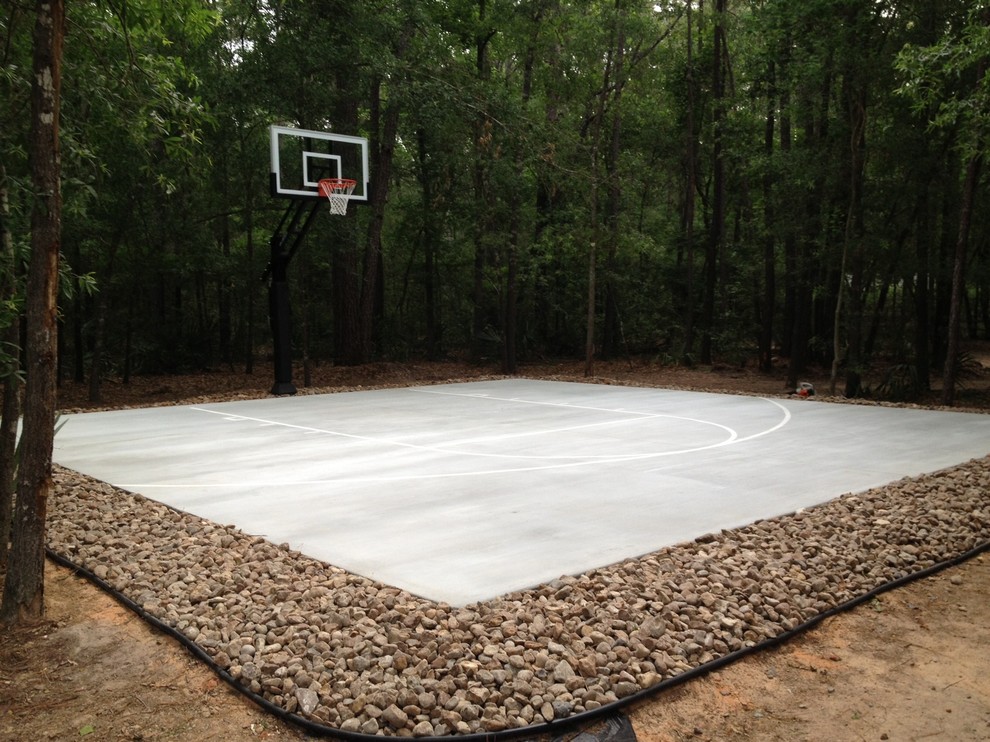 Inspiration for a large traditional backyard partial sun outdoor sport court in Houston.