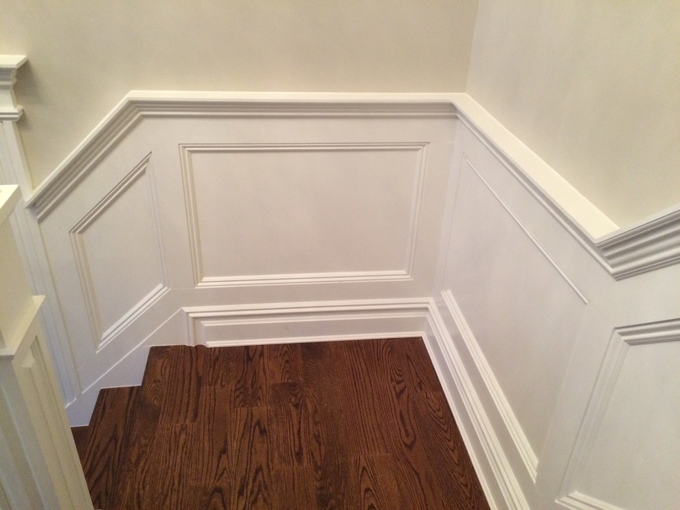 Design ideas for a mid-sized traditional wood l-shaped staircase in Philadelphia with painted wood risers.