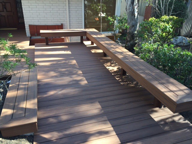 Photo of a large country backyard deck in Los Angeles with a pergola.