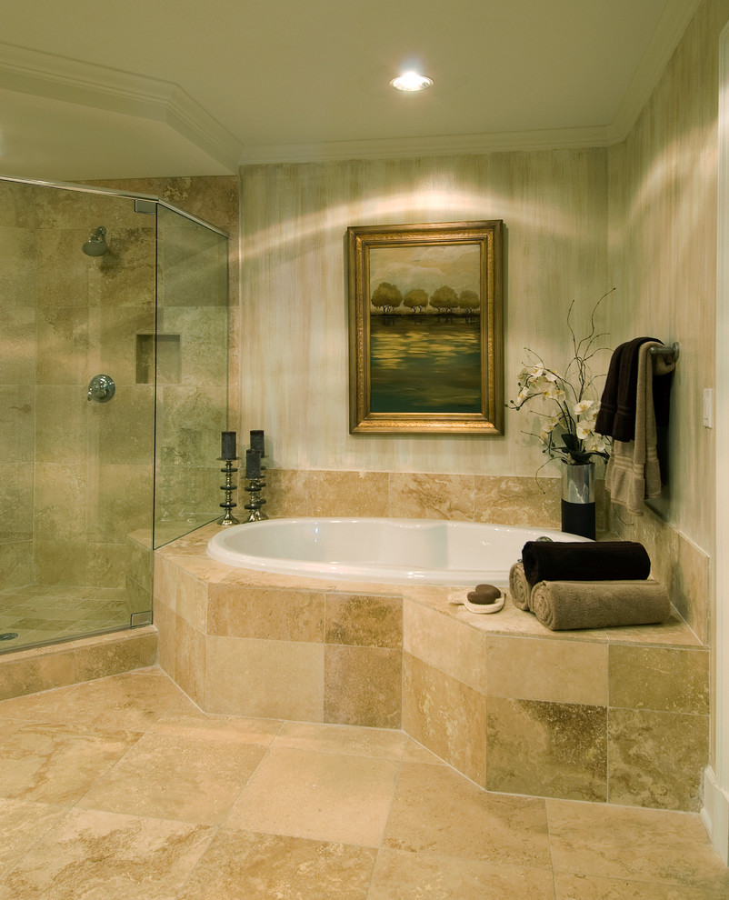 Design ideas for a mid-sized traditional master bathroom in Dallas with a drop-in tub, a corner shower, brown tile, travertine, beige walls, travertine floors, brown floor and a hinged shower door.
