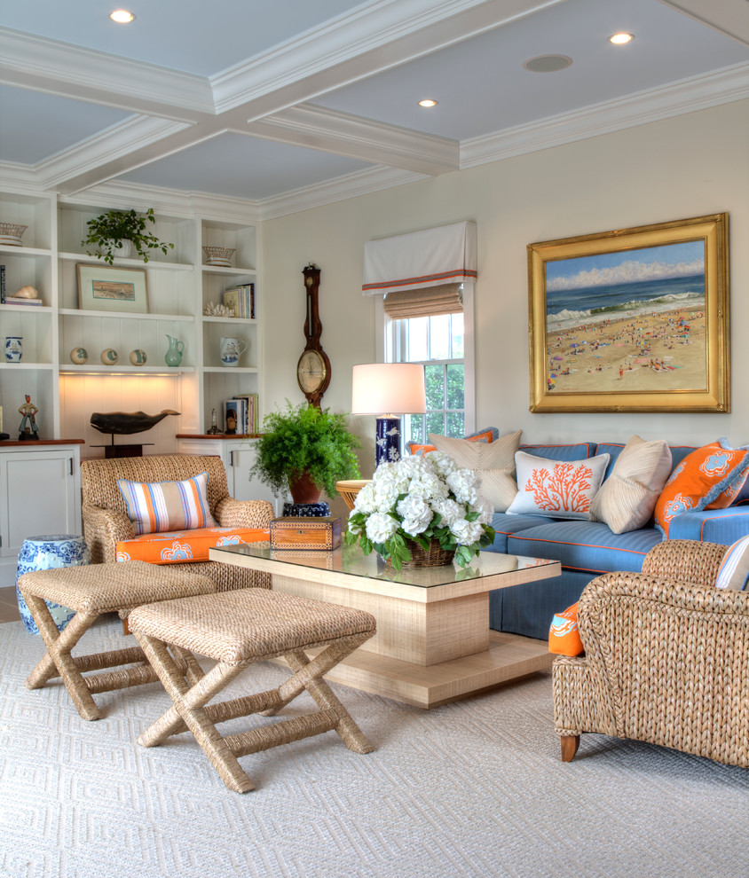Design ideas for a beach style living room in Boston with beige walls and carpet.