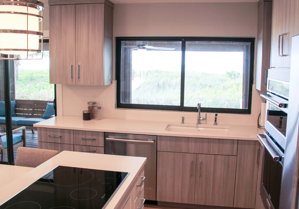 Example of a beach style kitchen design in Miami