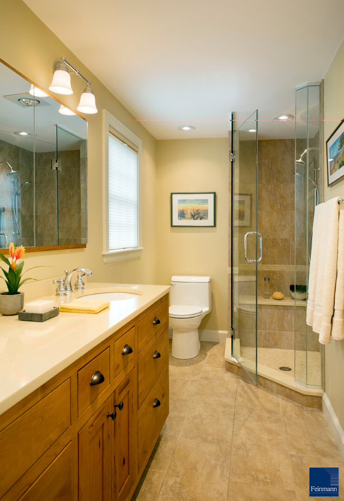 Drop-in bathtub - mid-sized transitional master beige tile drop-in bathtub idea in Boston with an undermount sink and medium tone wood cabinets