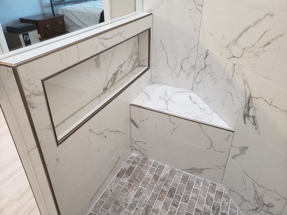 Inspiration for a large modern master bathroom in Houston with recessed-panel cabinets, grey cabinets, an open shower, a one-piece toilet, white tile, porcelain tile, grey walls, porcelain floors, an undermount sink, quartzite benchtops, white floor, a hinged shower door and white benchtops.