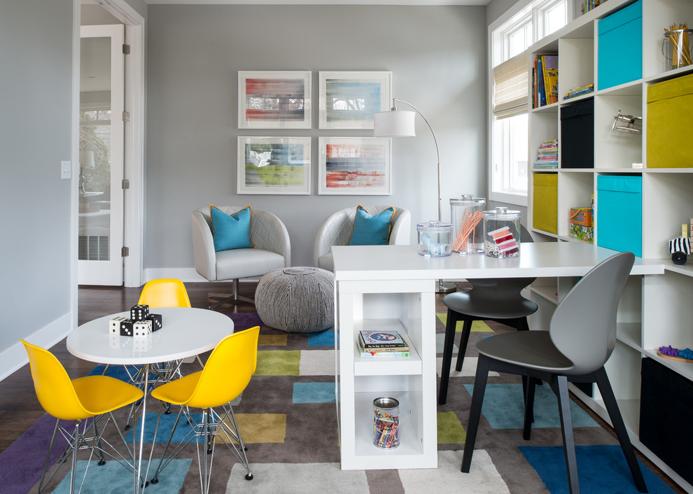This is an example of a transitional gender-neutral kids' study room in Minneapolis with grey walls.