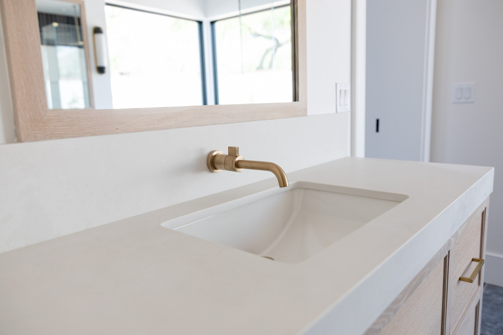 Example of a large transitional master white tile and porcelain tile porcelain tile, gray floor, double-sink, coffered ceiling and wainscoting freestanding bathtub design in Phoenix with recessed-panel cabinets, light wood cabinets, a bidet, white walls, an undermount sink, marble countertops, a hinged shower door, white countertops, a niche and a freestanding vanity