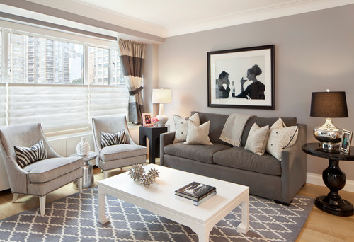 Gray living room with white coffee table. How to make a small space look bigger #smallspace #decorating