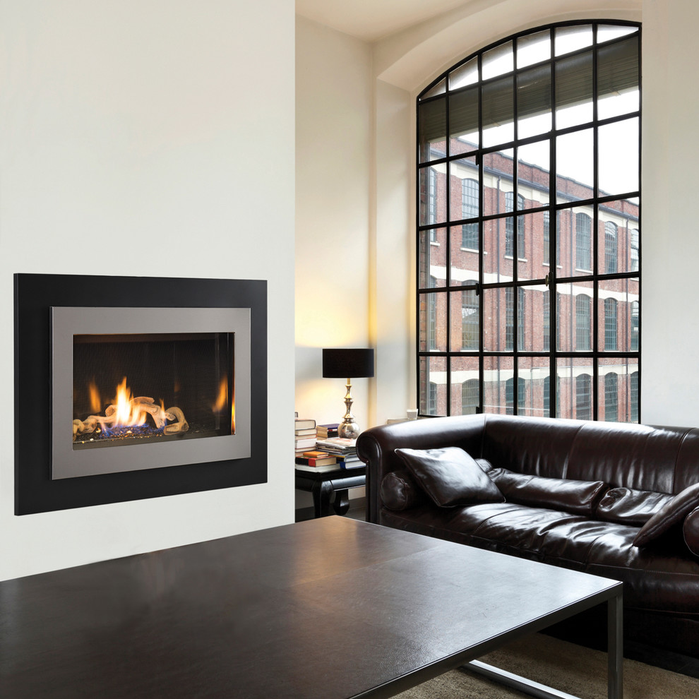 Inspiration for a contemporary living room in Orange County with a standard fireplace and a metal fireplace surround.