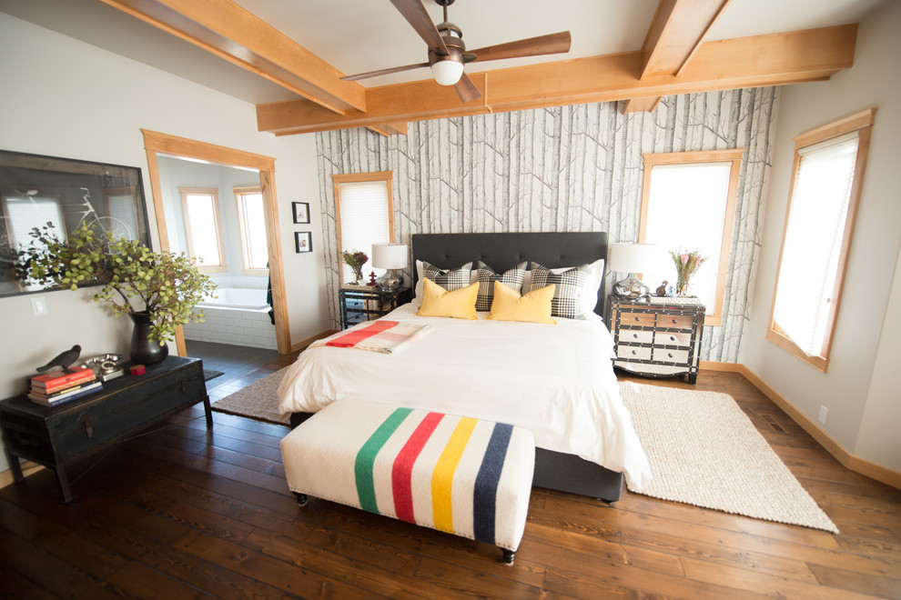 Inspiration for a transitional medium tone wood floor bedroom remodel in Calgary with white walls