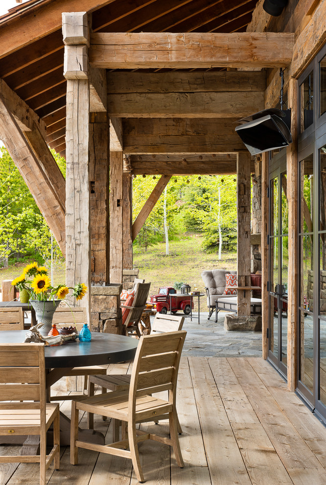 Inspiration for an expansive country backyard deck in Other with no cover.