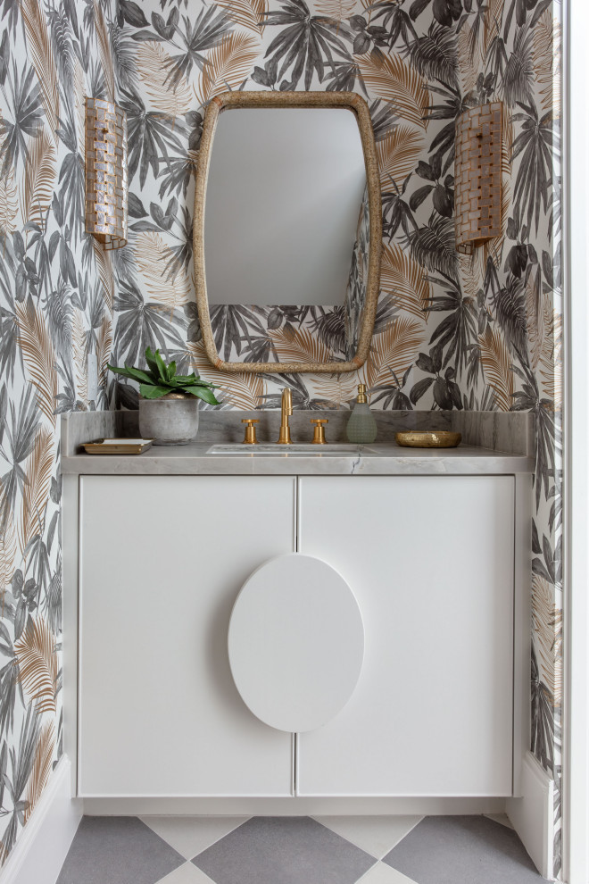 Inspiration for a contemporary gray floor and wallpaper powder room remodel in Houston with flat-panel cabinets, white cabinets, multicolored walls, an undermount sink, gray countertops and a built-in vanity