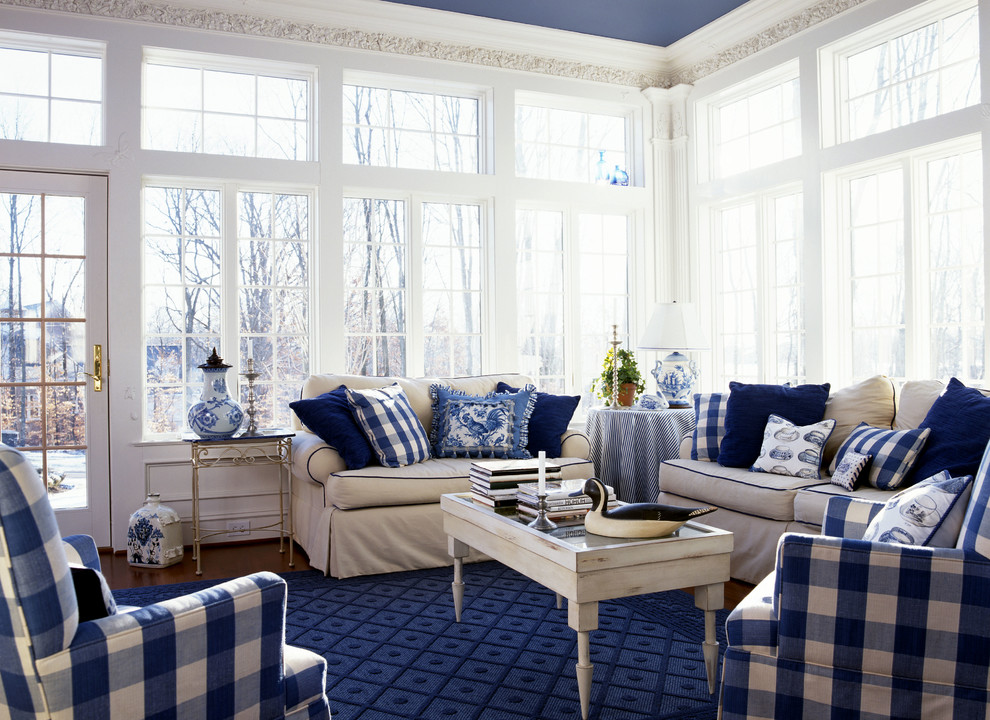 Sunroom - traditional medium tone wood floor and brown floor sunroom idea in DC Metro with blue walls
