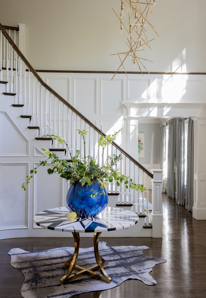 Example of a transitional home design design in Boston