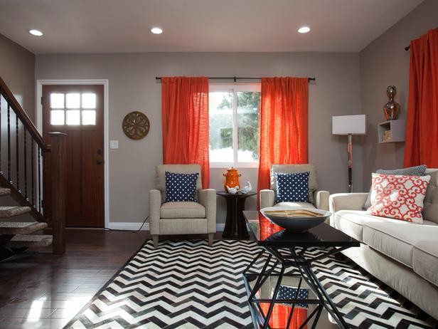 Inspiration for a small eclectic enclosed living room in New Orleans with grey walls and dark hardwood floors.