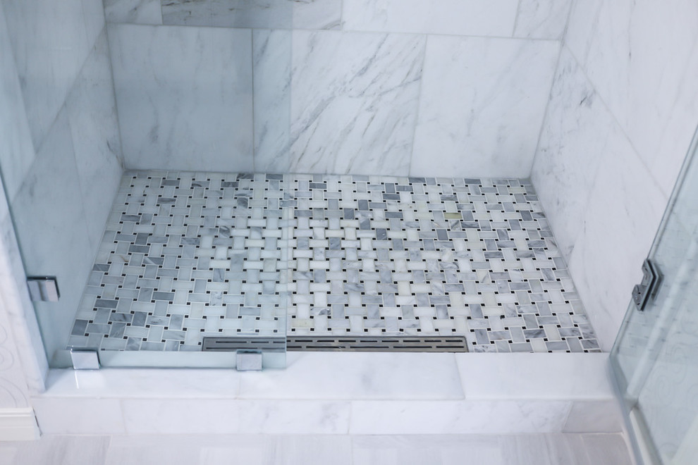 Inspiration for a mid-sized transitional master white tile and marble tile ceramic tile and gray floor alcove bathtub remodel with gray walls, beaded inset cabinets, white cabinets, a two-piece toilet, an undermount sink, quartzite countertops and a hinged shower door