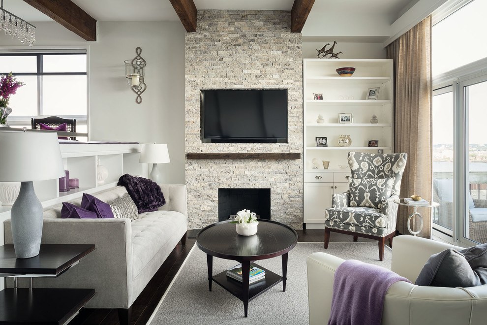 Photo of a mid-sized contemporary living room in Boston with a standard fireplace, a stone fireplace surround and a wall-mounted tv.