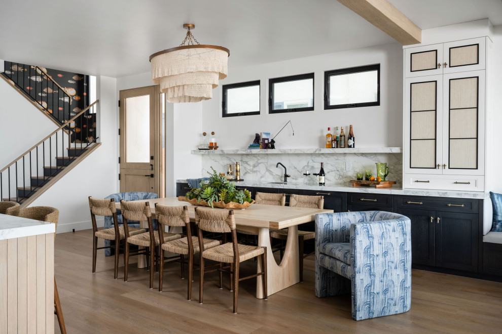 Inspiration for a coastal home bar remodel in Orange County
