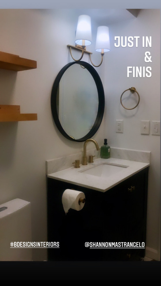 Photo of a small kids bathroom in Other with shaker cabinets, blue cabinets, an alcove shower, a one-piece toilet, subway tile, white walls, ceramic floors, an undermount sink, marble benchtops, black floor, a sliding shower screen, multi-coloured benchtops, a niche, a single vanity and a freestanding vanity.