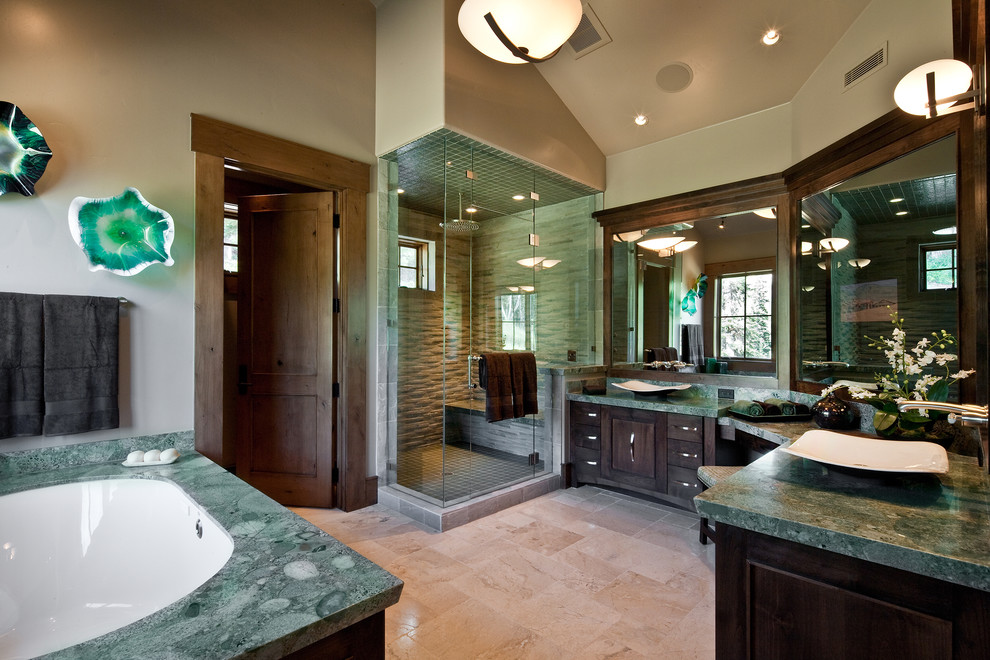 This is an example of a contemporary bathroom in Salt Lake City with a vessel sink and green benchtops.
