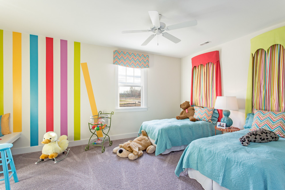 This is an example of a beach style gender-neutral kids' room in Richmond with multi-coloured walls, carpet and grey floor.