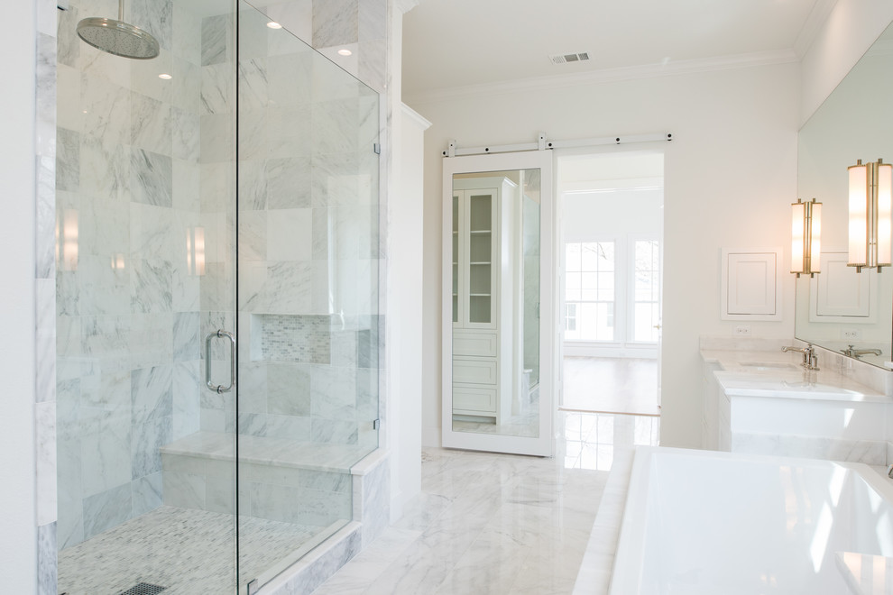 Design ideas for a large transitional master bathroom in Dallas with recessed-panel cabinets, white cabinets, a drop-in tub, an alcove shower, multi-coloured tile, ceramic tile, white walls, ceramic floors, a drop-in sink, granite benchtops, white floor, a hinged shower door and white benchtops.