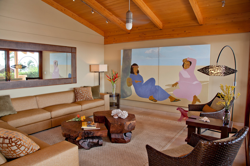 This is an example of a large tropical living room in Hawaii with beige walls and no tv.