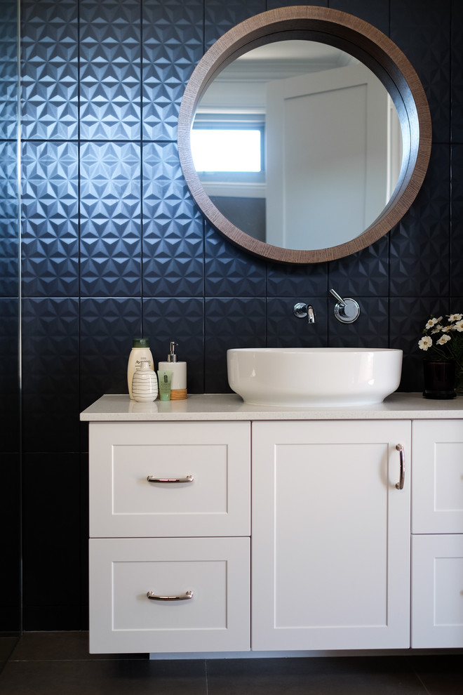 Inspiration for a large contemporary bathroom in Perth with shaker cabinets, white cabinets, blue tile, ceramic tile, blue walls, porcelain floors, a vessel sink, engineered quartz benchtops, grey floor and white benchtops.