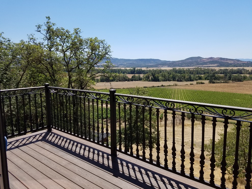 Mid-sized transitional backyard deck photo with decking and no cover