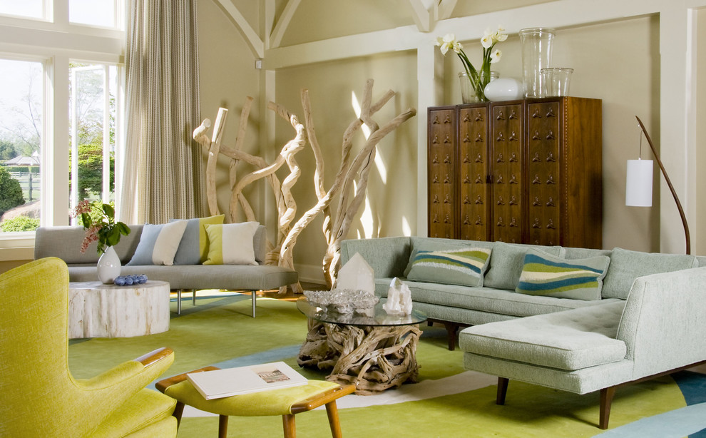 Inspiration for an expansive midcentury living room in New York with beige walls and green floor.