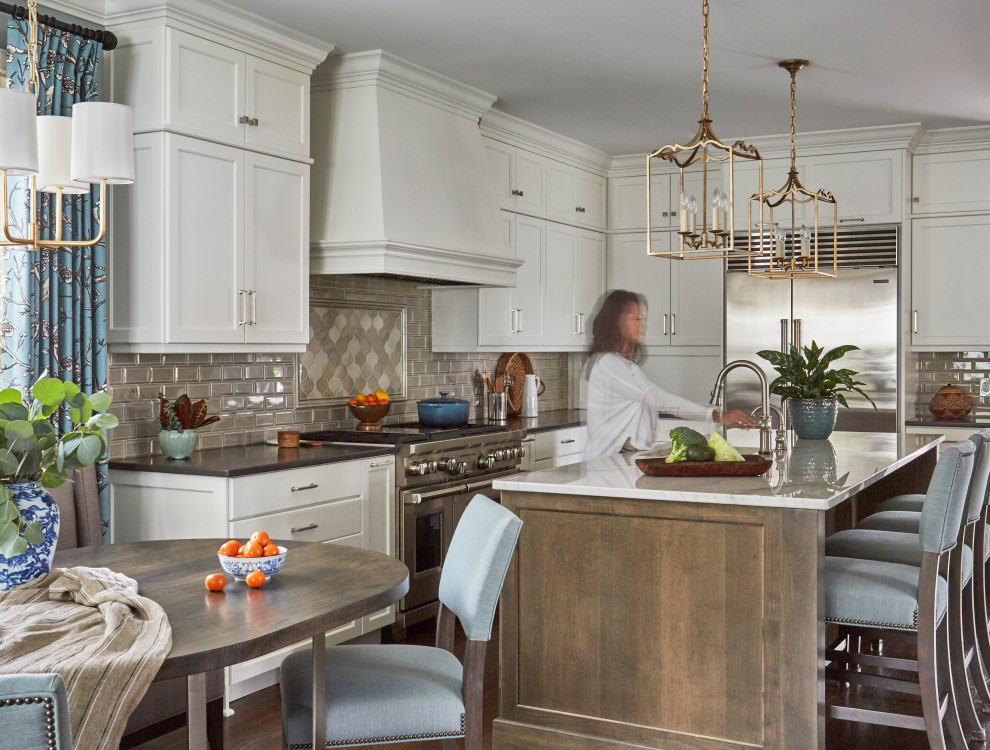 Example of a transitional dark wood floor and brown floor kitchen design in Chicago