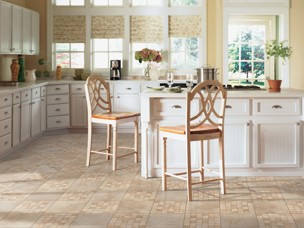 Inspiration for a mid-sized timeless l-shaped ceramic tile and brown floor kitchen remodel with shaker cabinets, gray cabinets, beige backsplash and an island