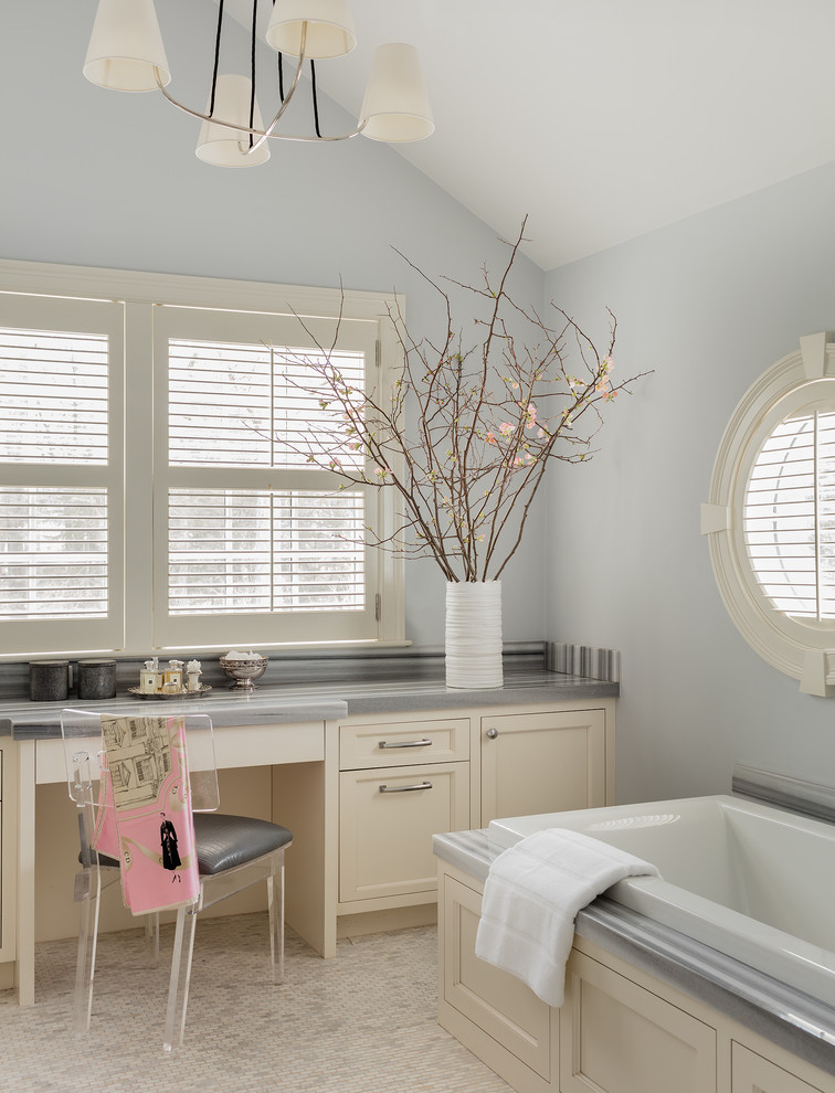 Example of a transitional home design design in Boston