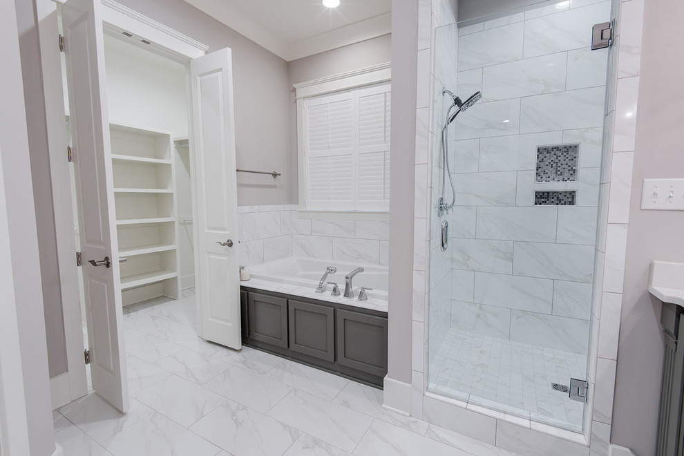 Inspiration for a large arts and crafts bathroom in Miami with flat-panel cabinets, grey cabinets, a drop-in tub, a wall-mount toilet, white tile, stone slab, grey walls, marble floors, a drop-in sink, marble benchtops and with a sauna.