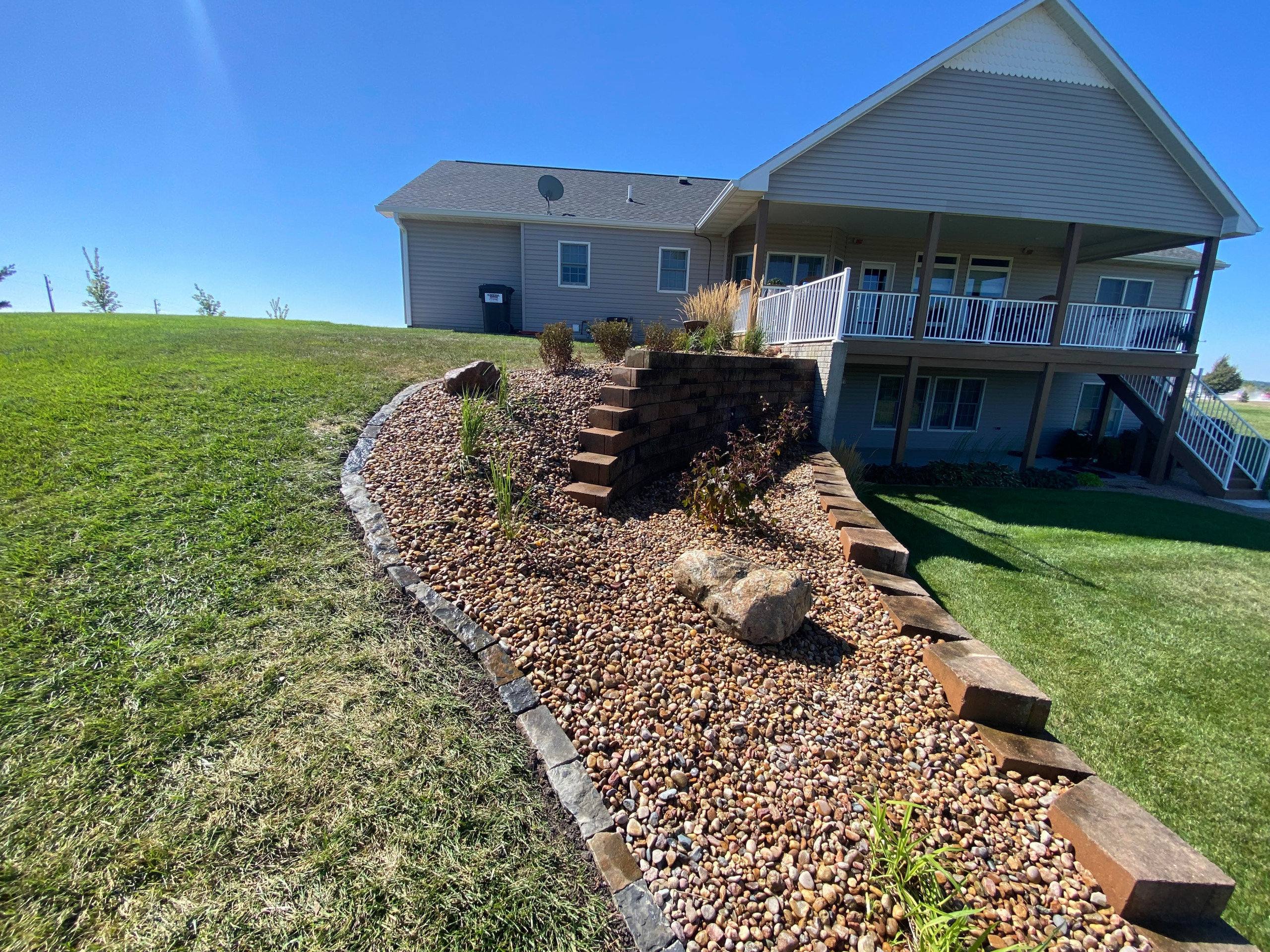 Upper Wall Rebuild & Softscaping