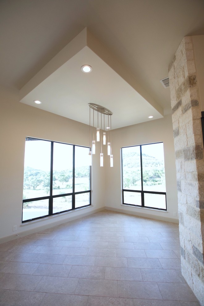 Transitional dining room photo in Austin