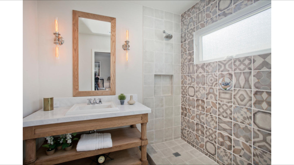 Example of a mid-sized transitional 3/4 beige tile, brown tile, white tile and ceramic tile porcelain tile doorless shower design in Los Angeles with quartz countertops, recessed-panel cabinets, light wood cabinets, a two-piece toilet, beige walls and an undermount sink