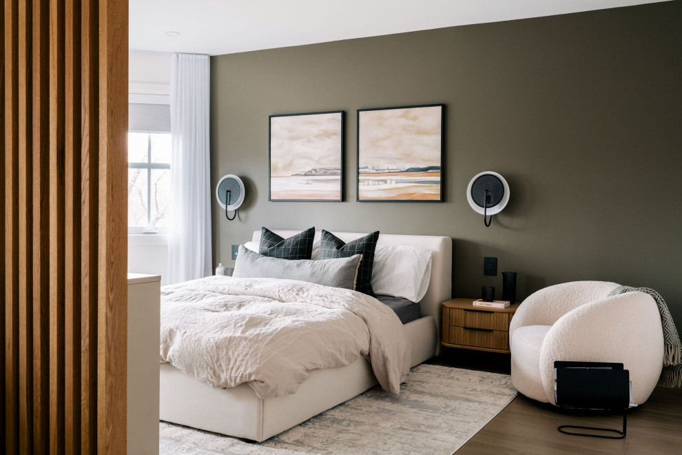 Design ideas for a large contemporary master bedroom in Toronto with green walls, dark hardwood floors and brown floor.