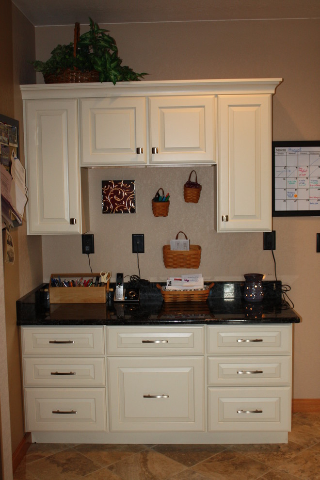 Inspiration for an u-shaped ceramic tile eat-in kitchen remodel in Denver with a farmhouse sink, open cabinets, white cabinets, quartz countertops, white backsplash, stainless steel appliances and an island