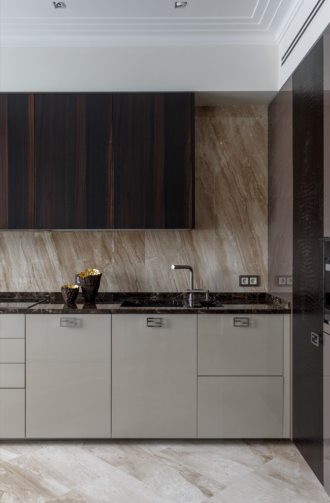 Photo of a large contemporary l-shaped eat-in kitchen in Moscow with dark wood cabinets, marble benchtops, beige splashback, marble splashback, ceramic floors, with island, beige floor, an undermount sink, flat-panel cabinets, coloured appliances and brown benchtop.