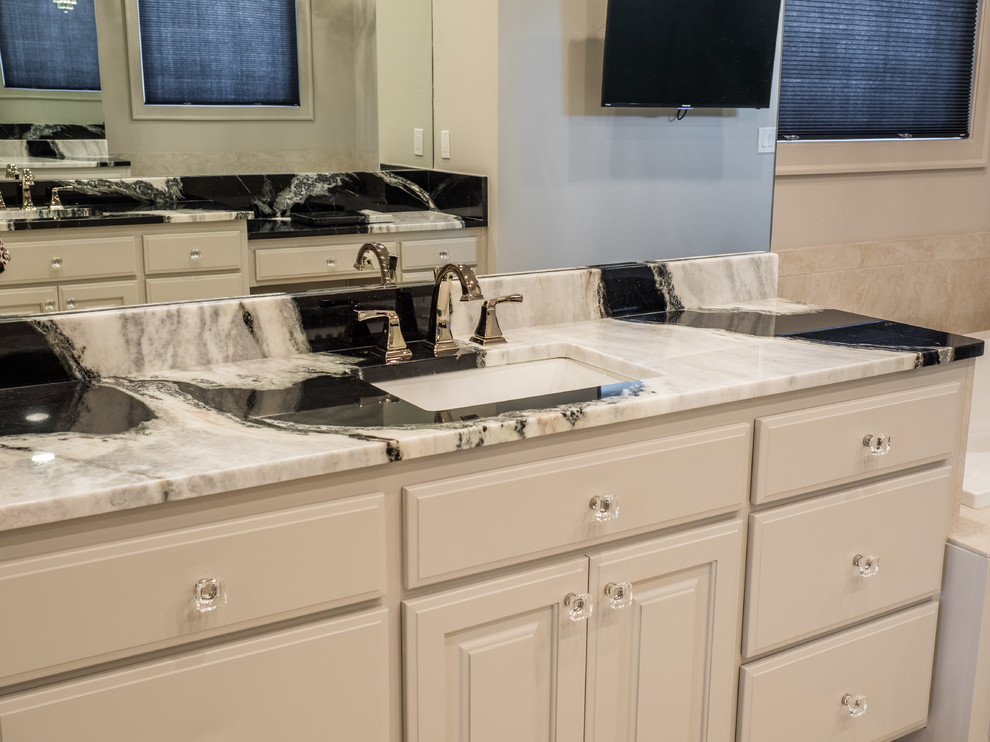 Inspiration for a large transitional master bathroom remodel with raised-panel cabinets, white cabinets, a wall-mount sink and marble countertops