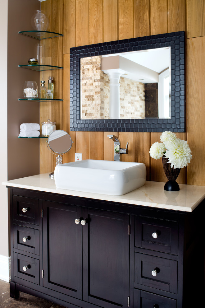 Transitional bathroom photo in Toronto with shaker cabinets, dark wood cabinets and a vessel sink
