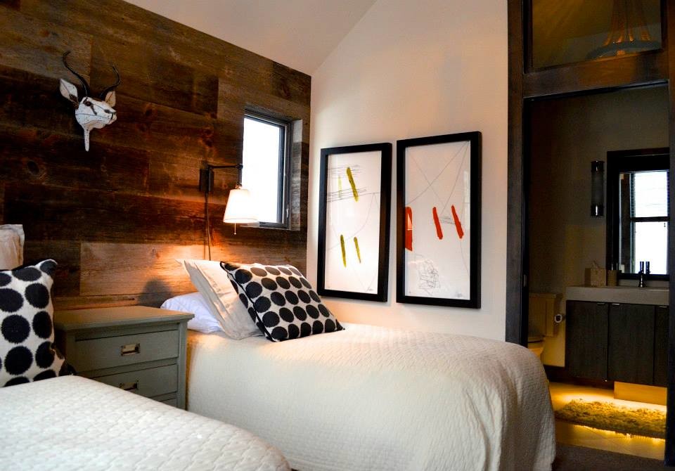 Example of a large mountain style guest carpeted bedroom design