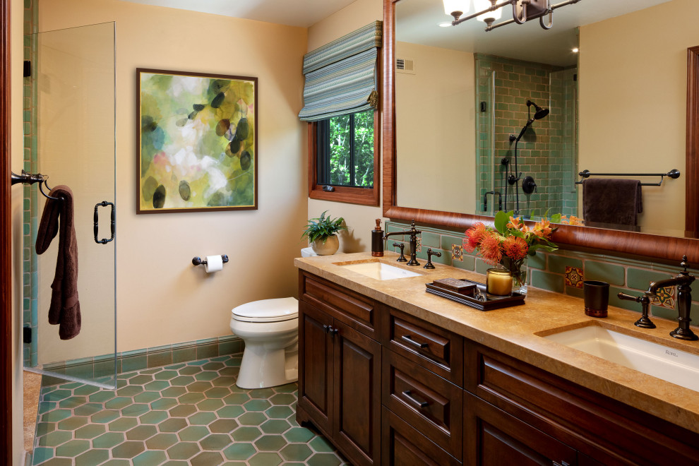 Mid-sized tuscan master double-sink wet room photo in Los Angeles with a one-piece toilet, an undermount sink and a hinged shower door