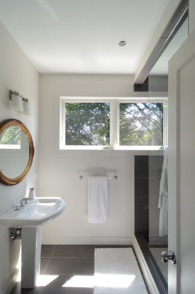 This is an example of a mid-sized contemporary master bathroom in Providence with gray tile and white walls.