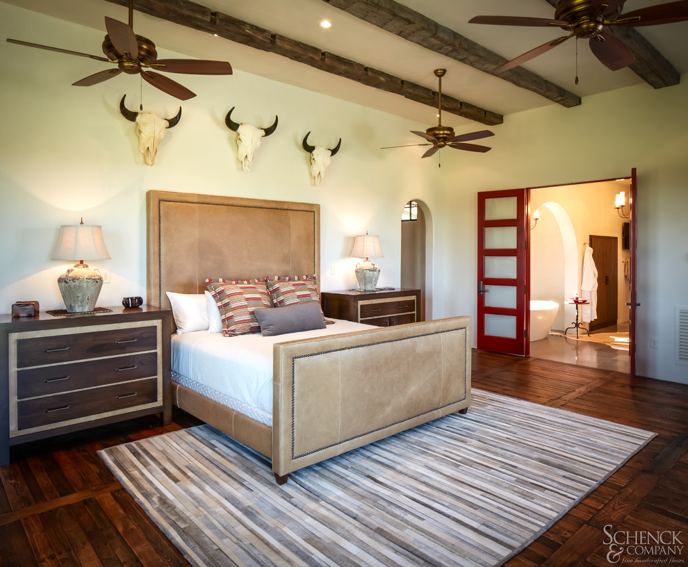 Photo of a country bedroom in Houston.