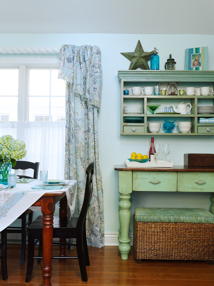 Example of a beach style dining room design in Chicago