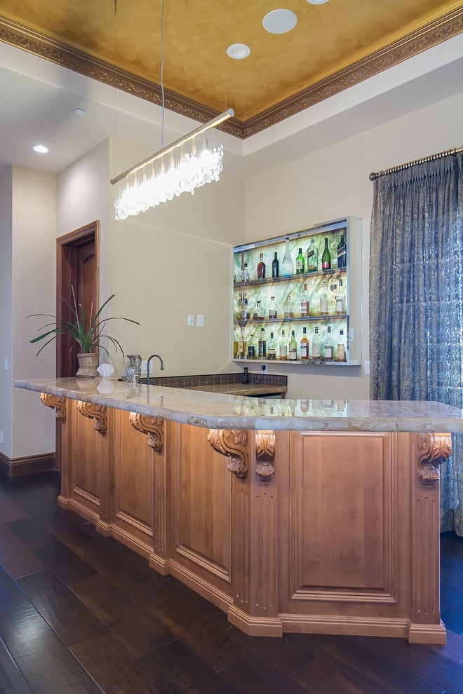 Design ideas for a large mediterranean single-wall wet bar in San Francisco with an undermount sink, open cabinets, soapstone benchtops and dark hardwood floors.