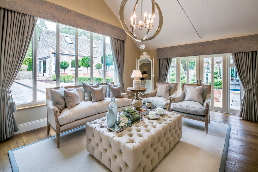 Inspiration for a transitional living room in Oxfordshire with beige walls and dark hardwood floors.