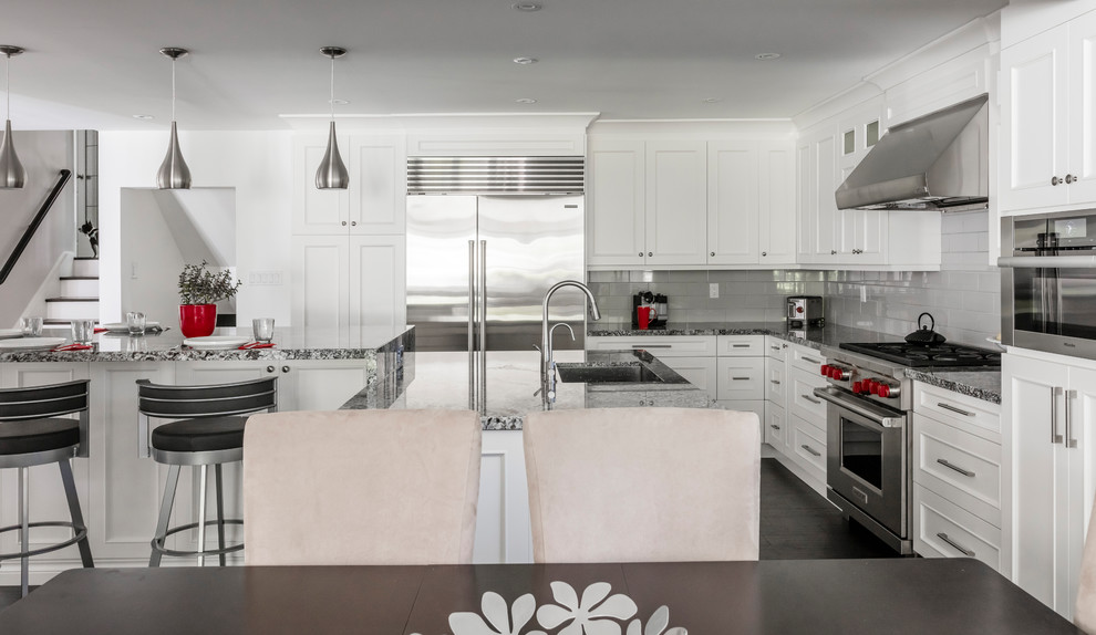 Example of a transitional kitchen design in Toronto